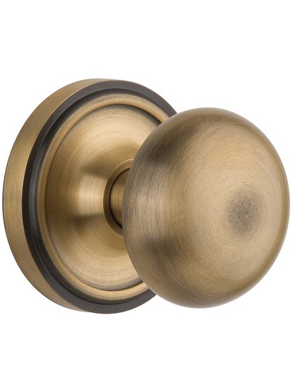 Classic Rosette Door Set With Solid Brass Door Knobs in Antique Brass.